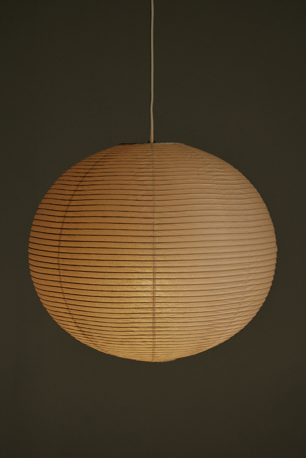 Japanese style paper lamp shade in various sizes made from highest quality cotton rice paper with natural faded color great alternatives for Isamu Noguchi Akari lamps pendant lights versatile fits in any space apartment studio retail commercial house