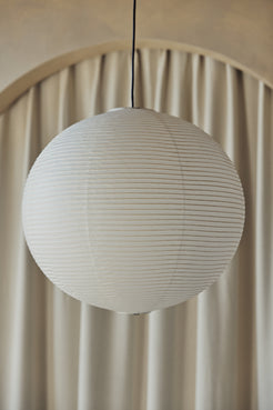 Japanese style paper lamp shade in various sizes made from highest quality cotton rice paper with natural faded color great alternatives for Isamu Noguchi Akari lamps pendant lights versatile fits in any space apartment studio retail commercial house