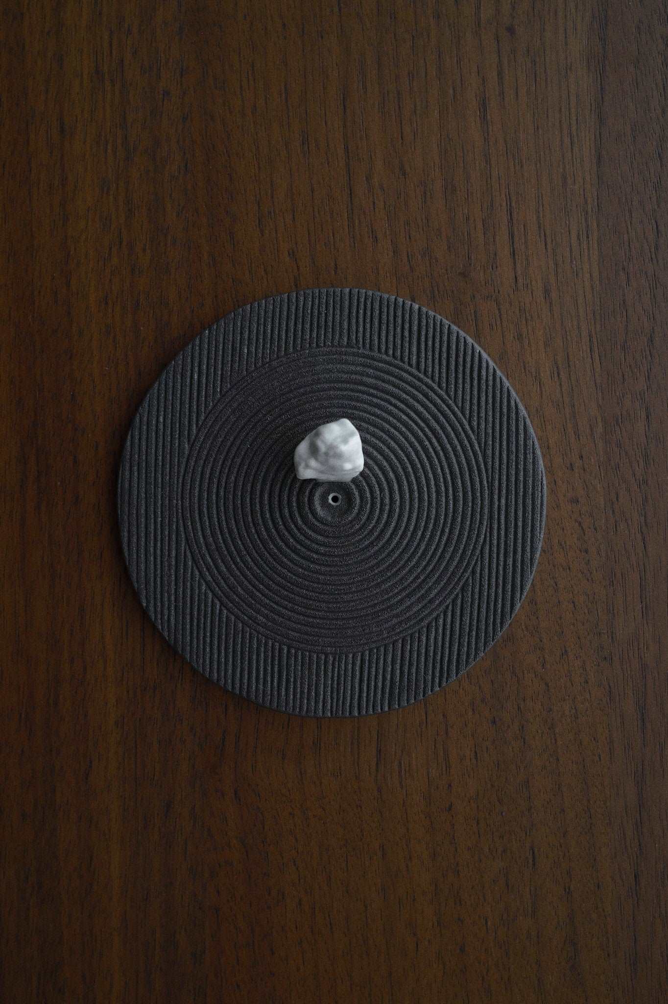 round shaped Concrete Incense Holder with Zen Garden pattern in black minimalist Japanese design Zen garden inspired Japandi Wabisabi handcrafted quality made incense burner ash catcher for incense sticks