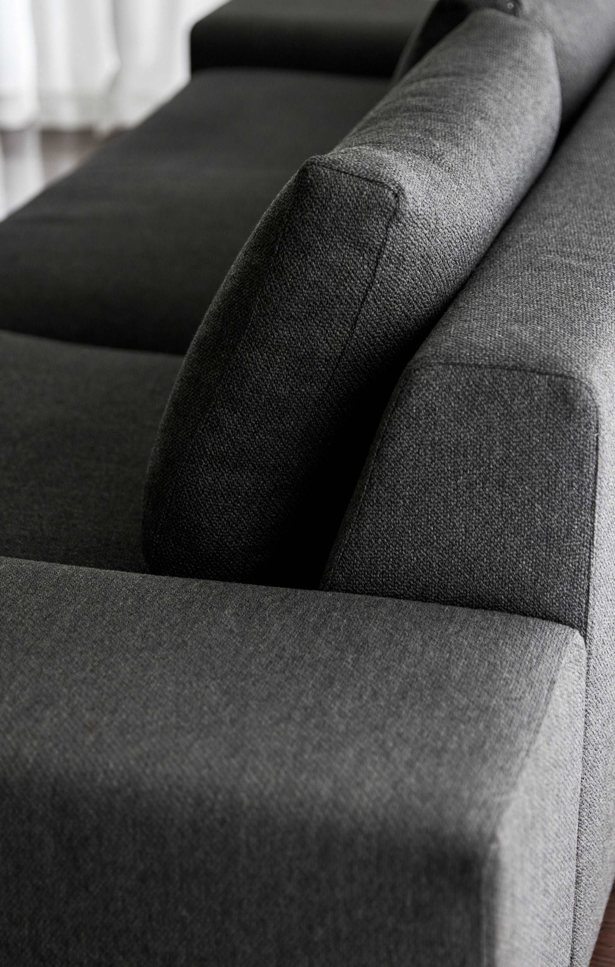 3 Seater Exclusif sofa designed by Didier Gomez for Ligne Roset. Feather-filled seat and back cushions (10% feathers/90% down), with wool fabric in grey color.